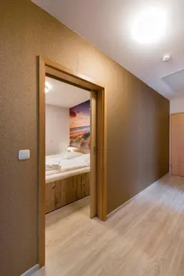 Ein Bett oder Betten in einem Zimmer der Unterkunft Haus Pamir - Fewo 28