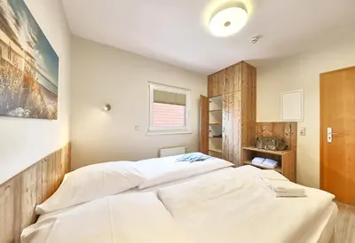Ein Bett oder Betten in einem Zimmer der Unterkunft Haus Pamir - Fewo 29