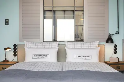 Ein Bett oder Betten in einem Zimmer der Unterkunft Lighthouse Hotel & Spa