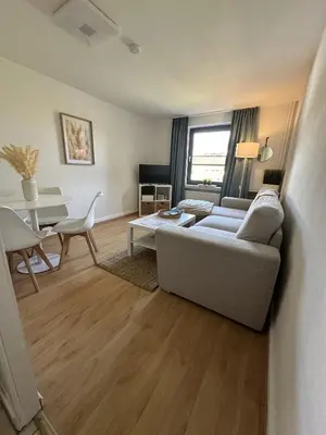 Ein Bett oder Betten in einem Zimmer der Unterkunft Gästehaus Bremer