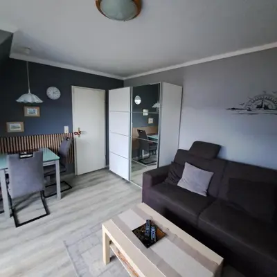 Ein Sitzbereich in der Unterkunft Apartment Boje