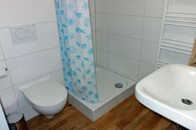 Ein Badezimmer in der Unterkunft Herzmuschel