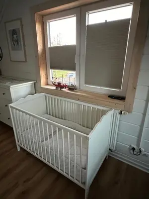 Ein Bett oder Betten in einem Zimmer der Unterkunft Ferienhaus Wiesenstrasse