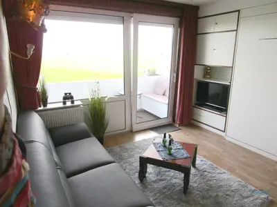 Ein Sitzbereich in der Unterkunft Ferienwohnung 223 Haus Nautic