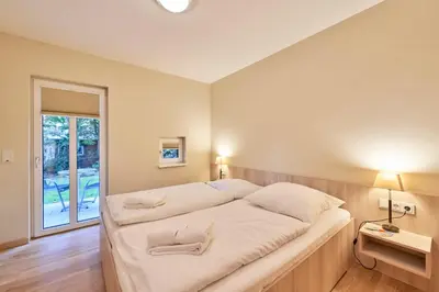 Ein Bett oder Betten in einem Zimmer der Unterkunft Haus Scharhörn-Riff - Fewo 14