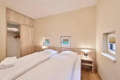 Ein Bett oder Betten in einem Zimmer der Unterkunft Haus Scharhörn-Riff - Fewo 14