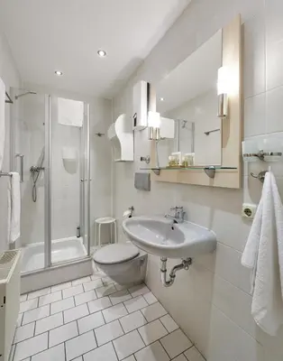 Ein Badezimmer in der Unterkunft Haus Seemuschel - Fewo 1