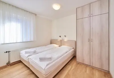 Ein Bett oder Betten in einem Zimmer der Unterkunft Haus Seemuschel - Fewo 1