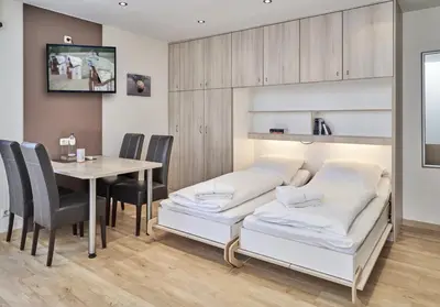 Ein Bett oder Betten in einem Zimmer der Unterkunft Haus Seemuschel - Fewo 2