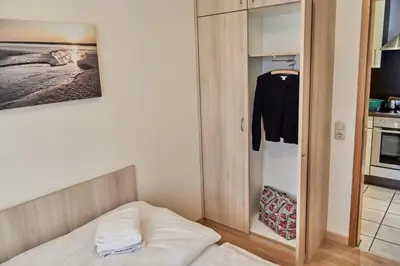 Ein Bett oder Betten in einem Zimmer der Unterkunft Haus Seemuschel - Fewo 3