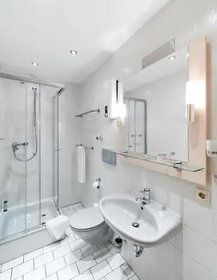 Ein Badezimmer in der Unterkunft Haus Seemuschel - Fewo 5