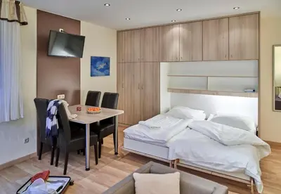 Ein Bett oder Betten in einem Zimmer der Unterkunft Haus Seemuschel - Fewo 6