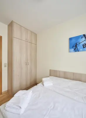 Ein Bett oder Betten in einem Zimmer der Unterkunft Haus Seemuschel - Fewo 8