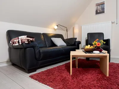 Ein Sitzbereich in der Unterkunft Appartement Strandstraße 10, Büsum