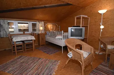 Ein Bett oder Betten in einem Zimmer der Unterkunft kleines Appartment auf Gestütsanlage