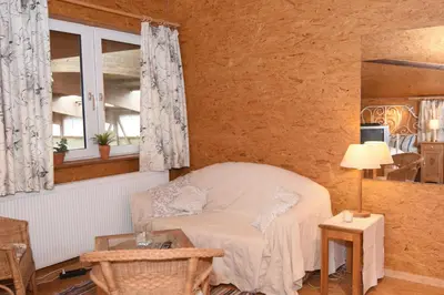 Ein Sitzbereich in der Unterkunft kleines Appartment auf Gestütsanlage
