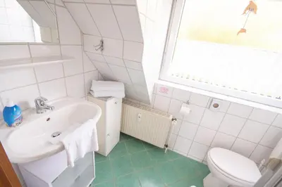 Ein Badezimmer in der Unterkunft Ferienwohnung 'Möwe Whg. 4'