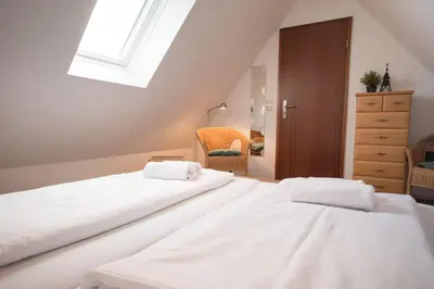 Ein Bett oder Betten in einem Zimmer der Unterkunft Ferienwohnung 'Möwe Whg. 4'