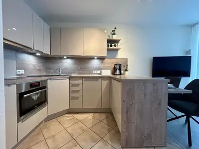 Küche/Küchenzeile in der Unterkunft Kurpark-Residenz W112