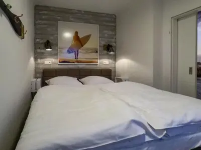 Ein Bett oder Betten in einem Zimmer der Unterkunft Seedeich