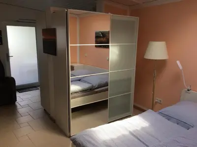 Ein Bett oder Betten in einem Zimmer der Unterkunft Deichkutscher