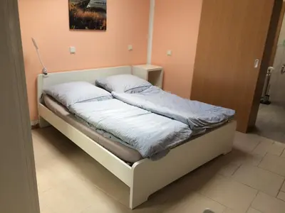 Ein Bett oder Betten in einem Zimmer der Unterkunft Deichkutscher