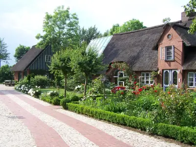Ein Garten an der Unterkunft Nordsee-Paradies