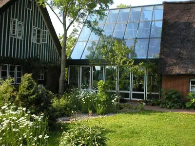 Ein Garten an der Unterkunft Nordsee-Paradies