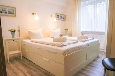 Ein Bett oder Betten in einem Zimmer der Unterkunft Nige Ooge 2