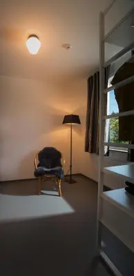 Ein Bett oder Betten in einem Zimmer der Unterkunft NordseeHeide-Lodges Cuxhaven