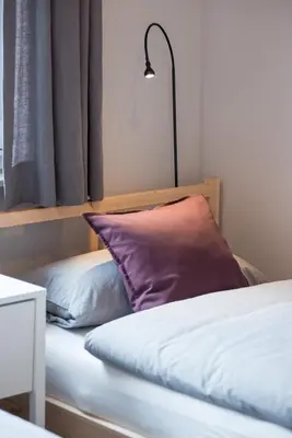 Ein Bett oder Betten in einem Zimmer der Unterkunft NordseeHeide-Lodges Cuxhaven