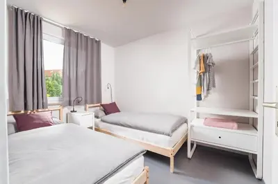 Ein Bett oder Betten in einem Zimmer der Unterkunft NordseeHeide-Lodges Cuxhaven