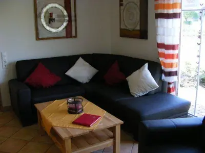 Ein Sitzbereich in der Unterkunft Chalet Belair Schmidt