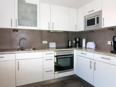 Küche/Küchenzeile in der Unterkunft Komfortables Ferienhaus in Friedrichskoog-Spitze