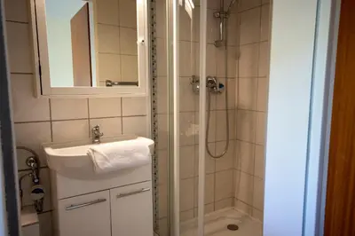 Ein Badezimmer in der Unterkunft Haus Frauenpreiss FeWo 55