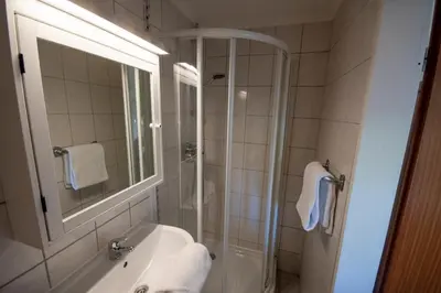 Ein Badezimmer in der Unterkunft Haus Frauenpreiss FeWo 55