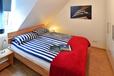 Ein Bett oder Betten in einem Zimmer der Unterkunft Haus Hamburg
