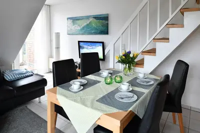 Ein Sitzbereich in der Unterkunft Haus Hamburg