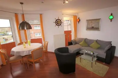 Ein Sitzbereich in der Unterkunft Haus Elbe 1 Wohnung 18
