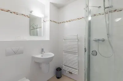 Ein Badezimmer in der Unterkunft Residenz am Yachthafen Wohnung 5