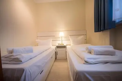Ein Bett oder Betten in einem Zimmer der Unterkunft Am Sahlenburger Strand 1 Whg. 15