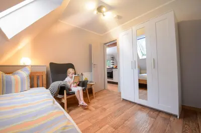 Ein Bett oder Betten in einem Zimmer der Unterkunft Ferienwohnung Kiebitz I