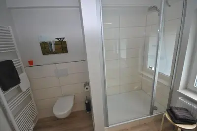 Ein Badezimmer in der Unterkunft Ferienhaus Deichgräfin