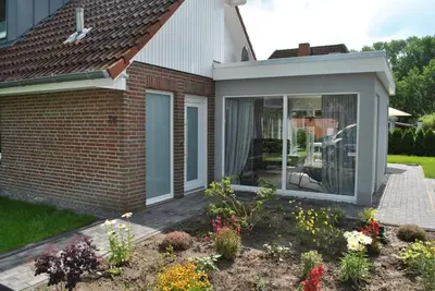 Ein Garten an der Unterkunft Ferienhaus Deichgräfin
