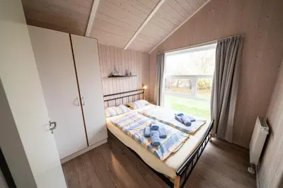 Ein Bett oder Betten in einem Zimmer der Unterkunft Ferienhaus Nordseeparadies