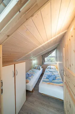 Ein Bett oder Betten in einem Zimmer der Unterkunft Ferienhaus Nordseeparadies