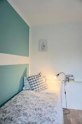 Ein Bett oder Betten in einem Zimmer der Unterkunft Ferienhaus Ryokan