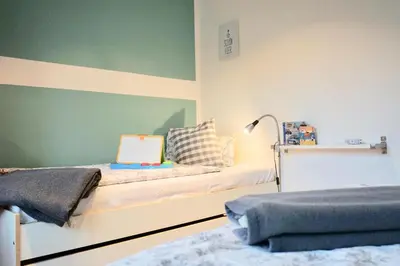 Ein Bett oder Betten in einem Zimmer der Unterkunft Ferienhaus Ryokan