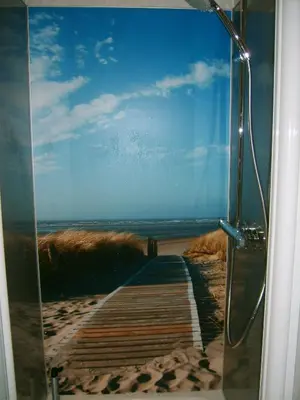 Ein Bett oder Betten in einem Zimmer der Unterkunft Ferienhaus Seeblick