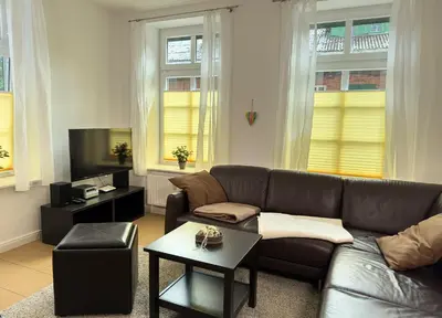 Ein Sitzbereich in der Unterkunft Ferienwohnung Medemspeicher